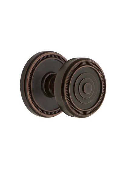 Grandeur Soleil Rosette Door Set with Soleil Knobs in Timeless Bronze.